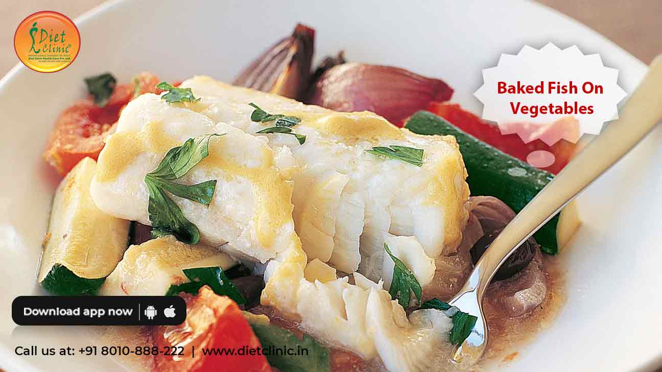 Baked fish on vegetables